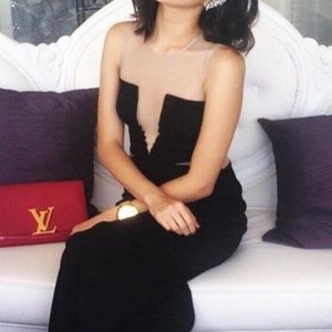 BCBGMaxAzria cutout mesh sleeveless jumpsuit.